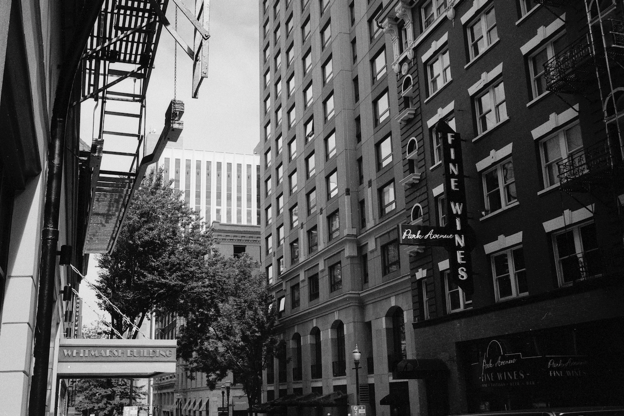 Black-and-white photo of art deco buildings in downtown Portland, Oregon.