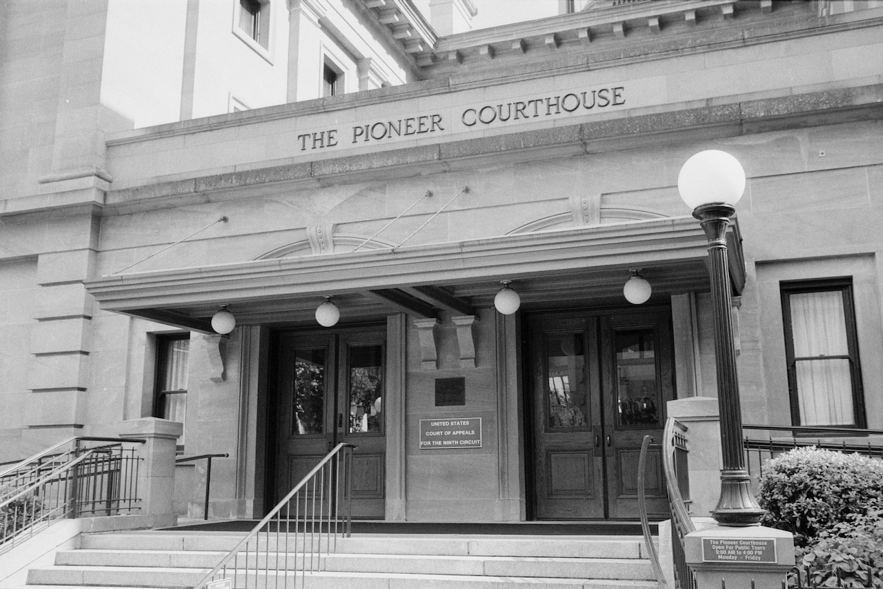 Black-and-white photo of Pioneer Courthouse exterior in Portland, Oregon.